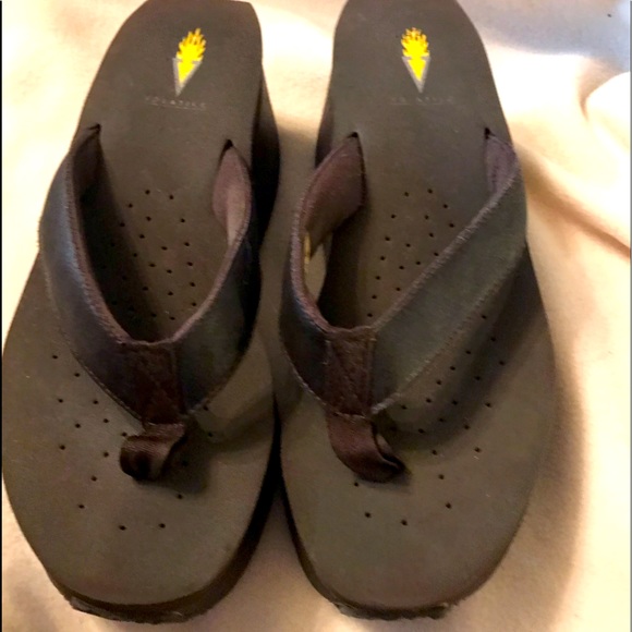 Brown flip flops